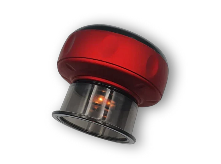 "Electric dynamic cupping therapy device with red light therapy and gua sha scraping massage applied on the back for muscle recovery and pain relief."
